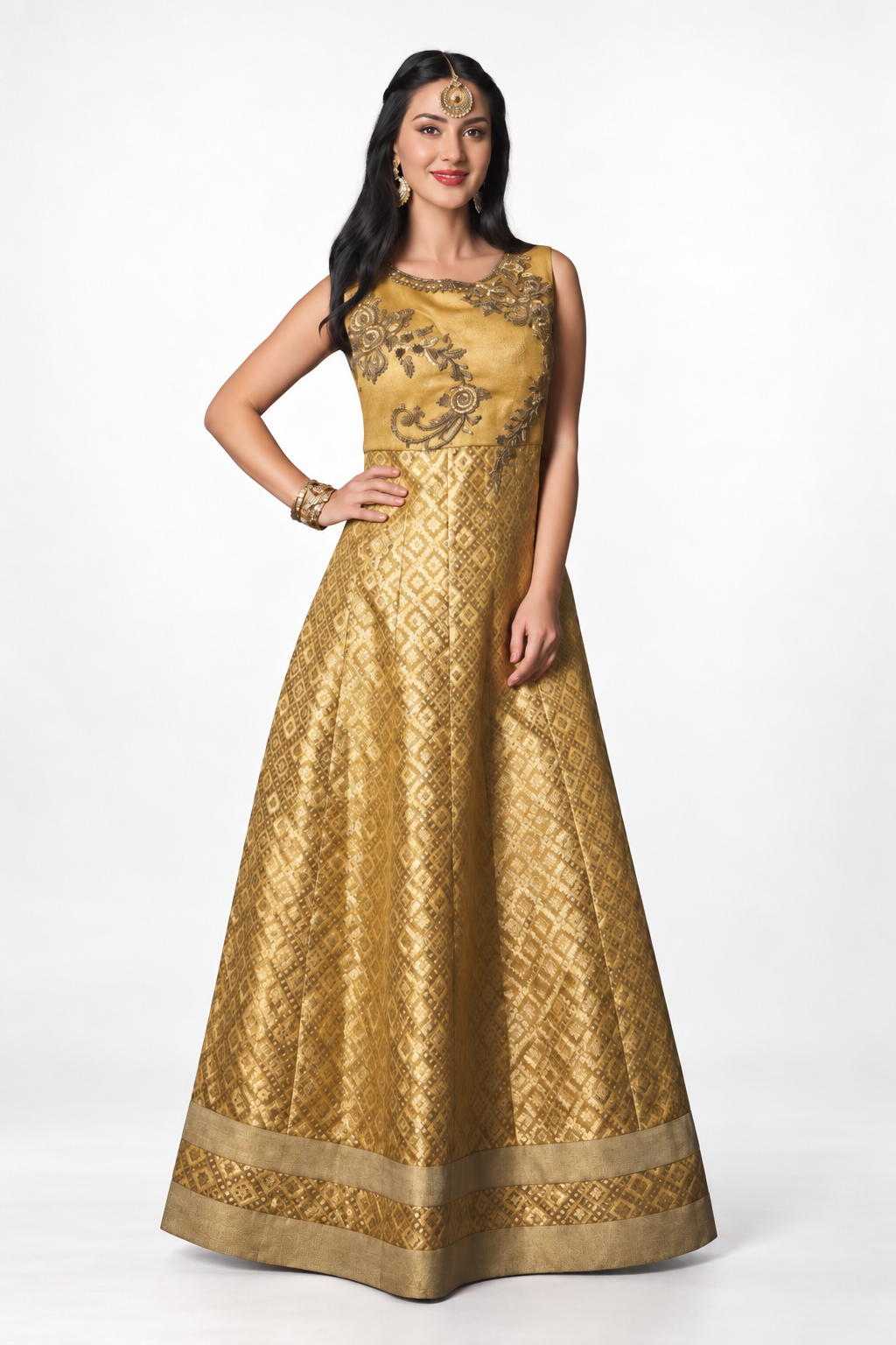 Smiling model wearing a gold floor-length festive gown with intricate motifs